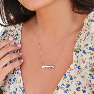 silver memorial necklace on a model