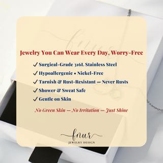 A promotional graphic for jewelry, featuring a large beige rounded square with red and blue text about 316L stainless steel jewelry. In the background, a silver necklace is draped over an open white jewelry box.
